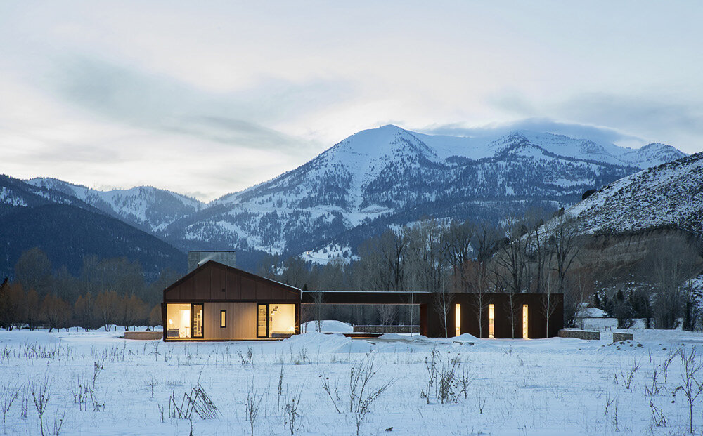 Exterior of a house in the snow.